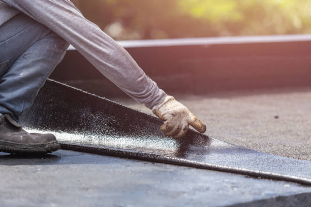 Professional Emergency Waterproofing technician working in Merrick, NY